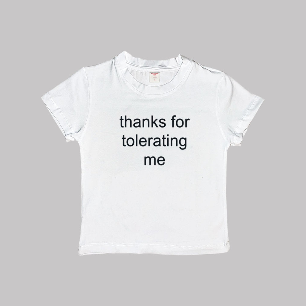 White cropped baby tee with 'thanks for tolerating me' text print