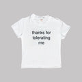 White cropped baby tee with 'thanks for tolerating me' text print