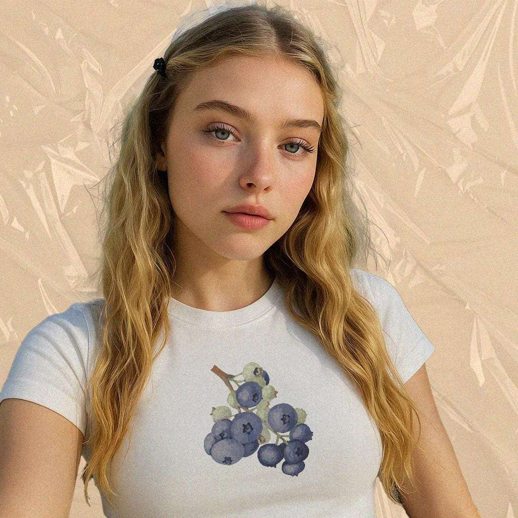 White baby crop tee with grape graphic print on front