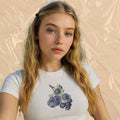 White baby crop tee with grape graphic print on front