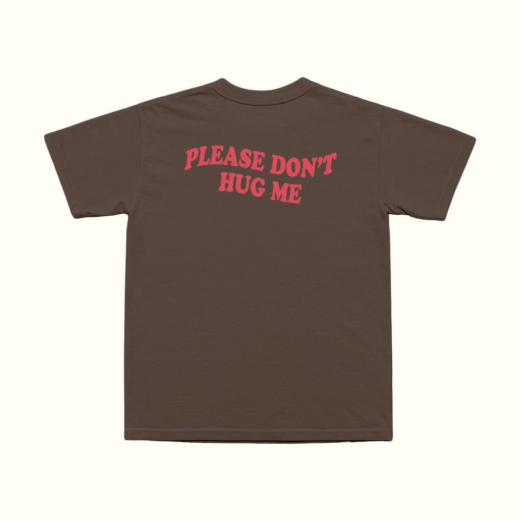 Dark chocolate T-shirt front with red 'PLEASE DON'T HUG ME' graphic