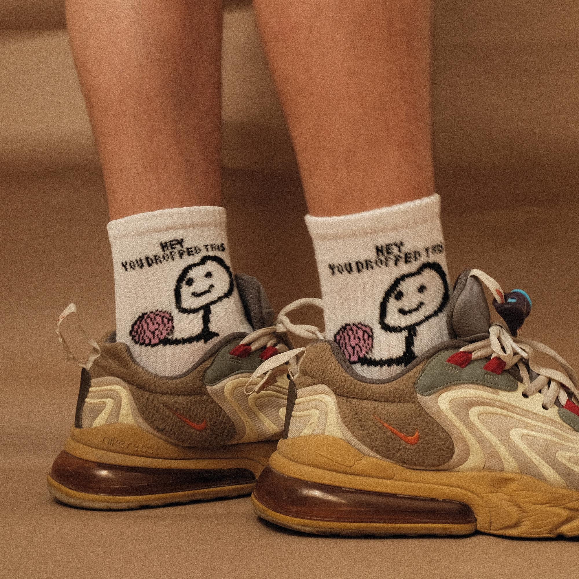 Calcetines con diseño de cerebro "You Dropped Your Brain" (Paquete de 3 pares)
