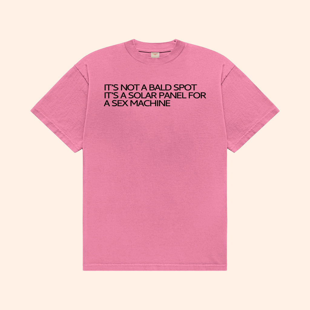 Pink T-shirt with front slogan: "IT’S NOT A BALD SPOT" "SOLAR PANEL"