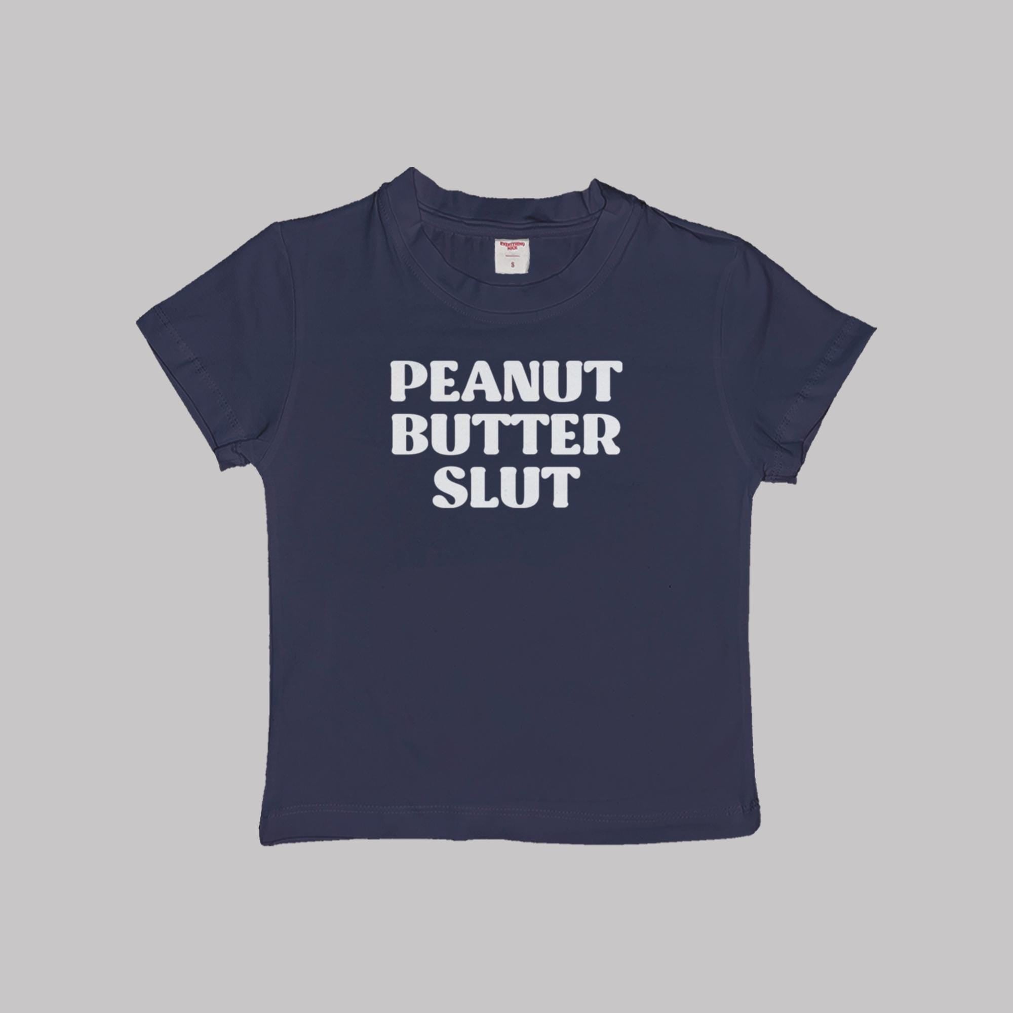 Navy crop baby tee with “PEANUT BUTTER SLUT” front graphic