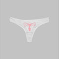 White thong panty with pink uterus and vagina graphic on the front