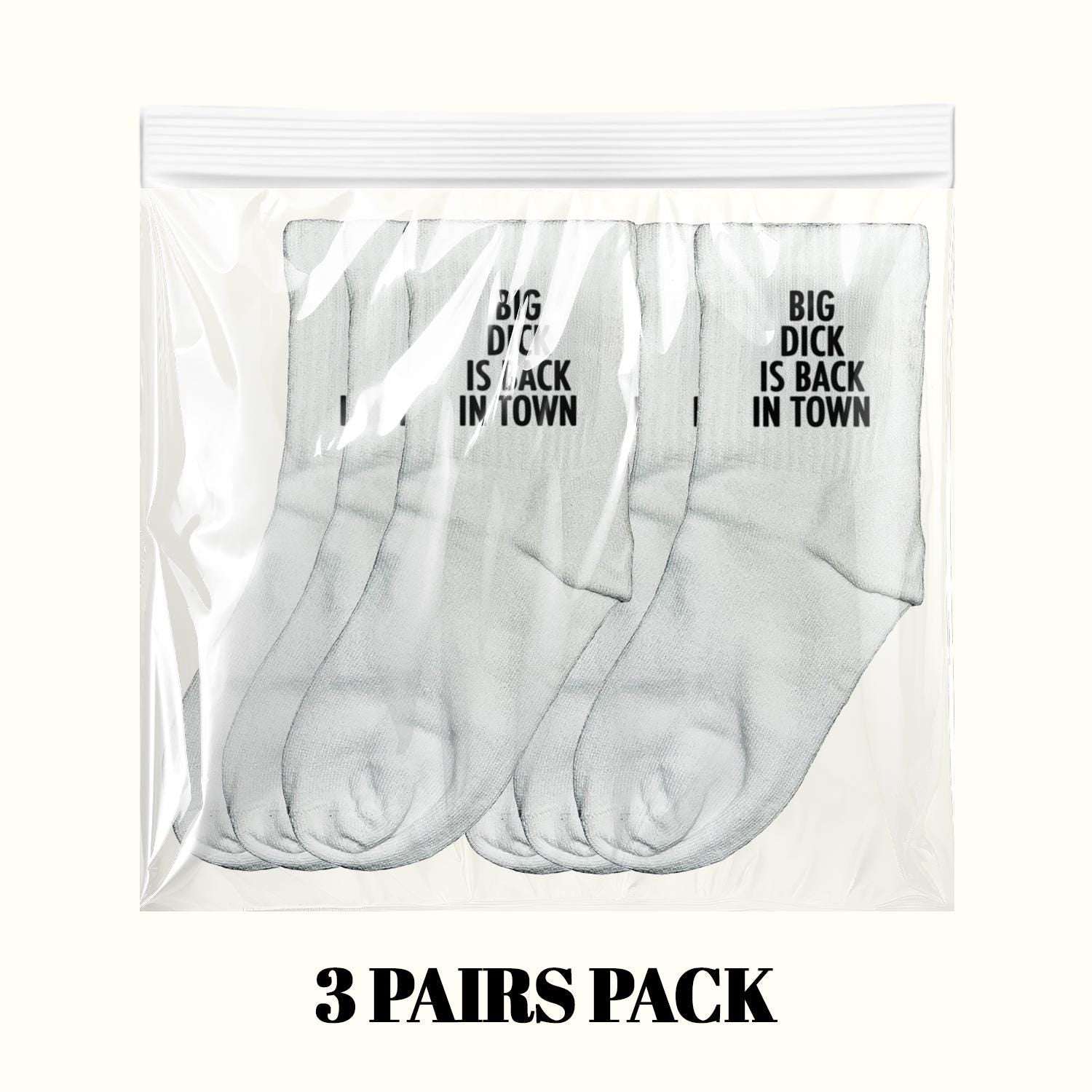 Three-pack of white crew socks in clear bag, with black "BIG DICK IS BACK IN TOWN"