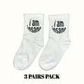 White crew socks with black “I am insane” text