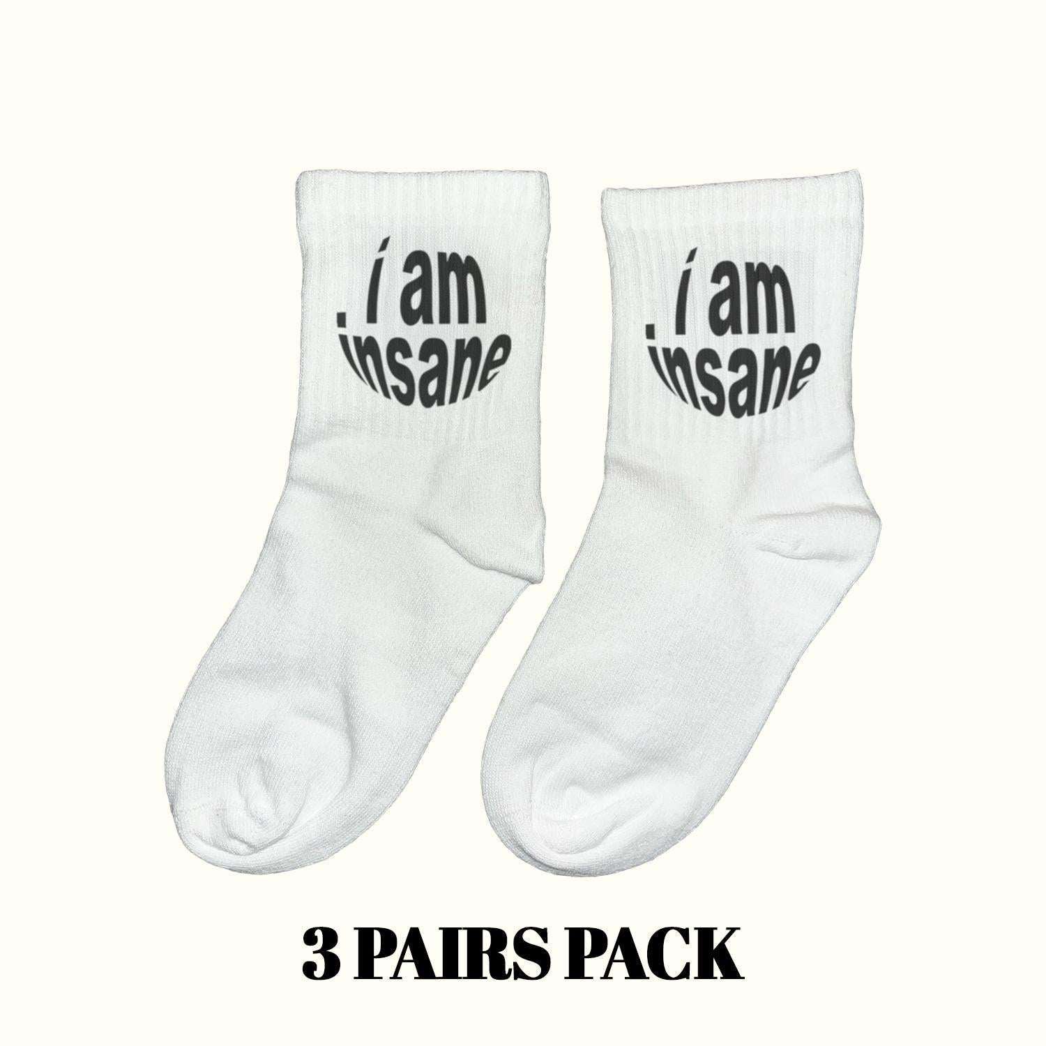 White crew socks with black “I am insane” text